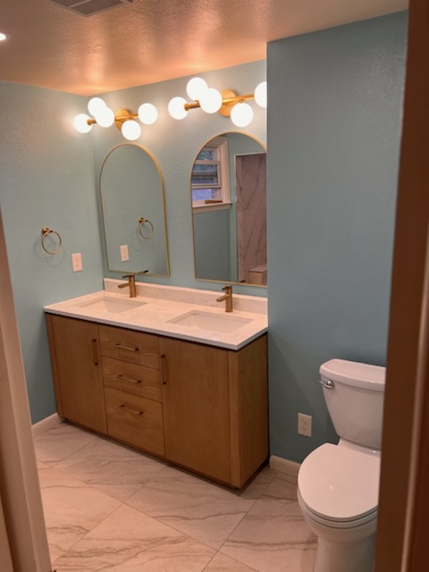 Luxury Bathroom Remodeling - Complete Renovation with Modern Fixtures and Custom Design